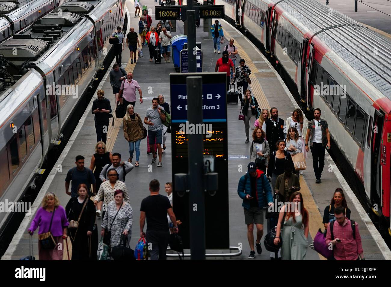 People at King's Cross railway station in London, as many families embark on getaways at the start of summer holidays for many schools in England and Wales. Picture date: Friday July 22, 2022. Stock Photo