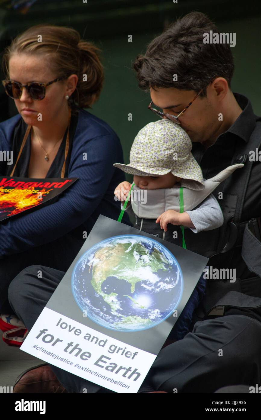 London, England, UK 22/07/2022 Members of Extinction Rebellion Buddhists hold a silent walk to Vanguard Asset management company where they sit in meditative silence s part of an ongoing series of actions against the company Stock Photo