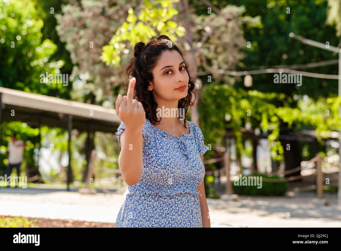 standing dress fuck Beautiful brunette woman wearing summer dress standing on city park,  outdoors showing middle finger doing fuck you and feeling good Stock Photo  - Alamy