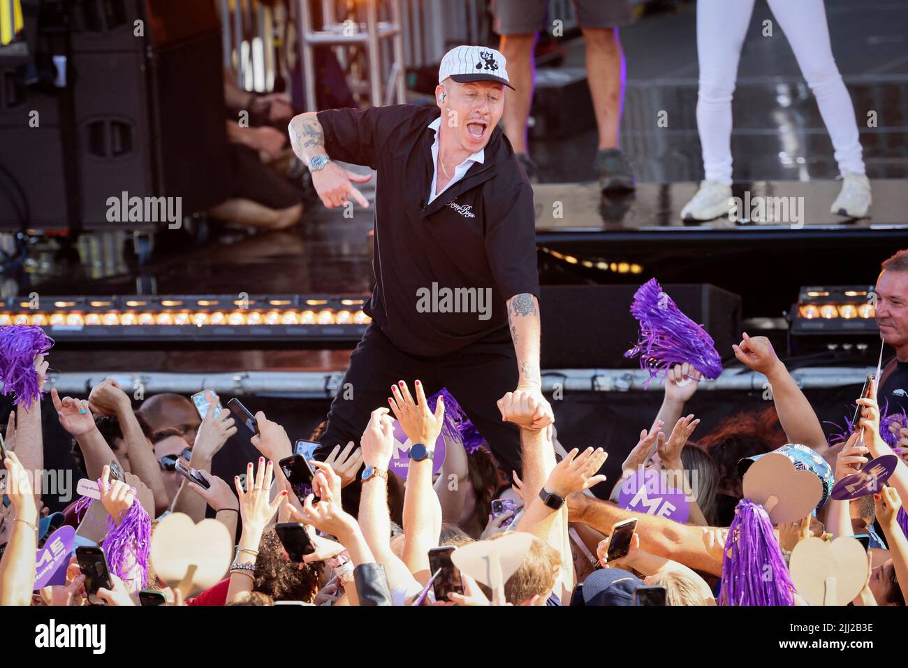 Singer Macklemore crowd surfs during a performance on ABC's 'Good Morning America' show in New York City, U.S., July 22, 2022.  REUTERS/Brendan McDermid Stock Photo