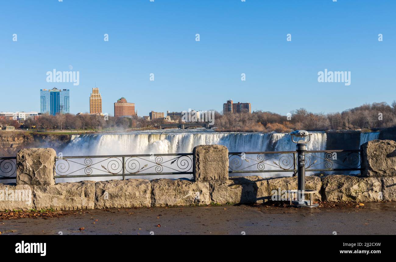 Niagara Falls, Ontario, Canada - December 13 2021 : Coin operated binocular viewer telescope. American Falls in the background. Stock Photo