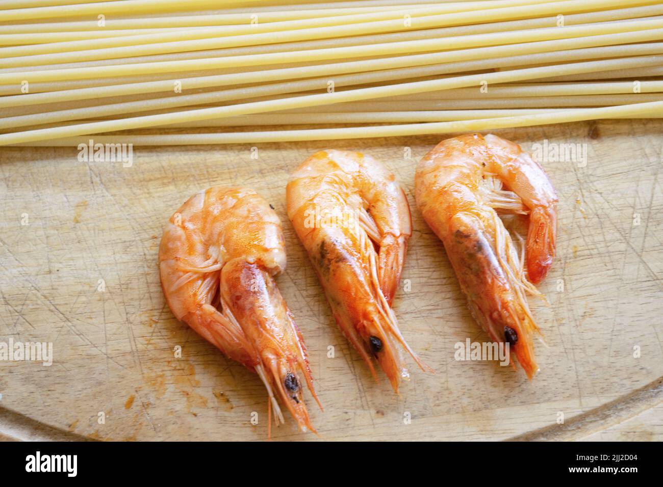 bucatini pasta with fresh scampi Stock Photo