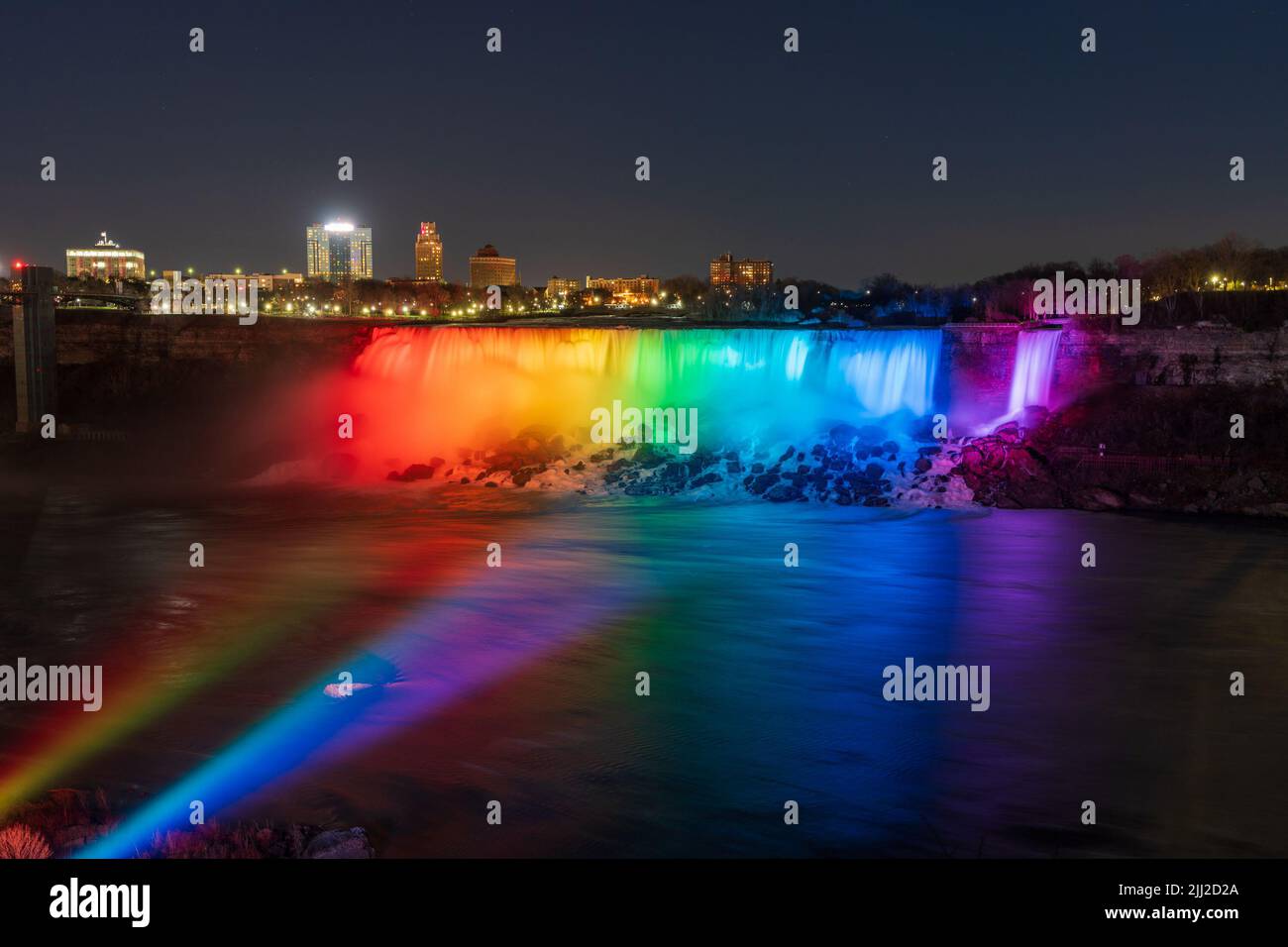 Niagara Falls American Falls winter illumination in night time. Stock Photo