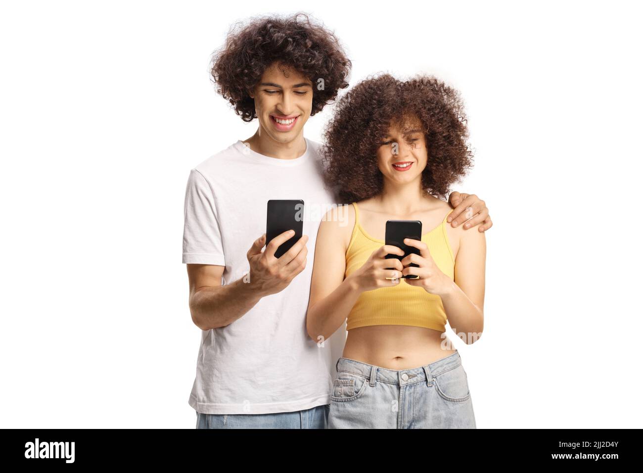 Guy and girl with curly hair using smartphones isolated on white background Stock Photo