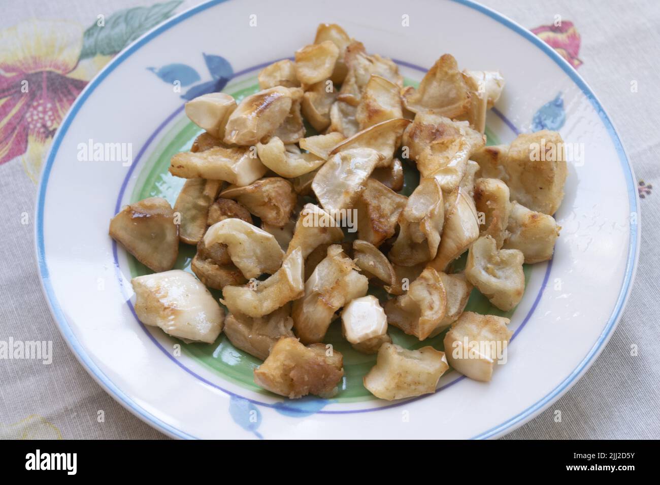 eggplant cut into cubes and fried Stock Photo