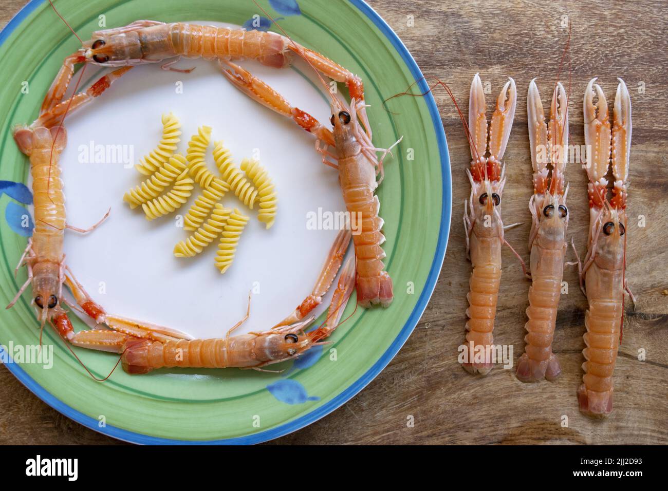 ingredients to prepare pasta with fresh shrimps Stock Photo