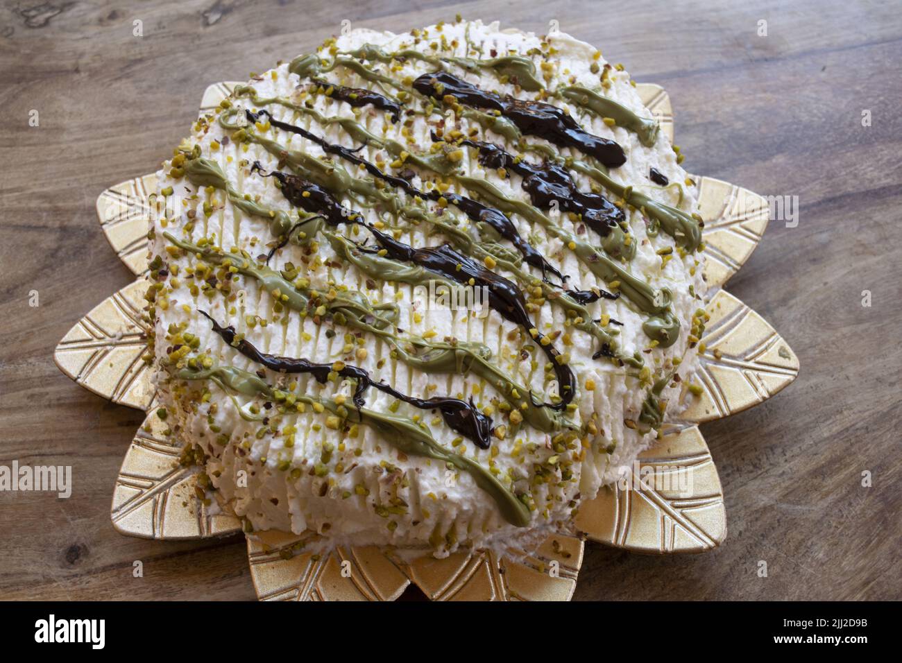 homemade pistachio and chocolate cream cake Stock Photo