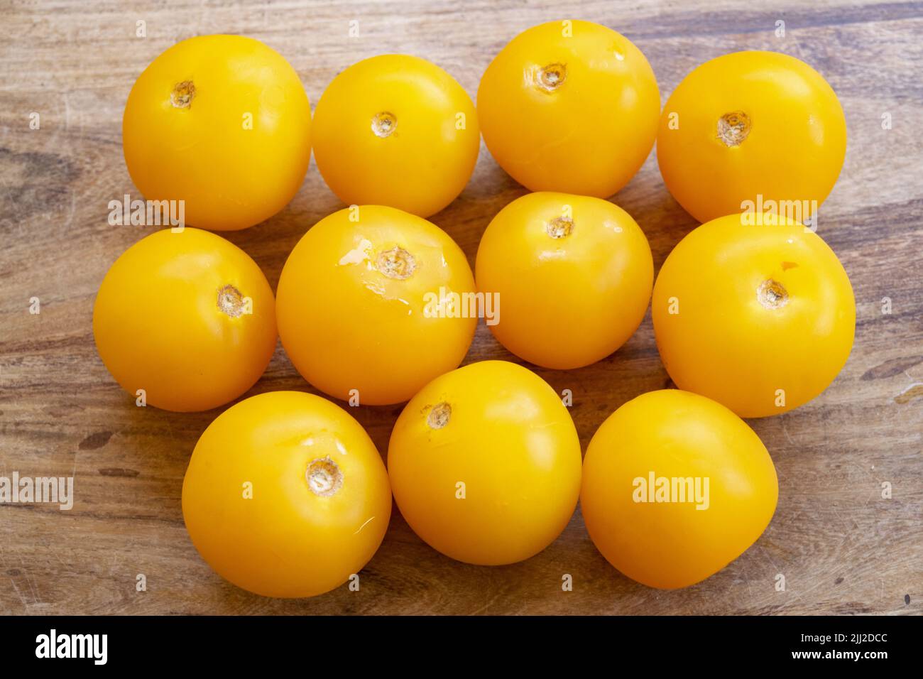 gorup of ripe yellow tomatoes Stock Photo
