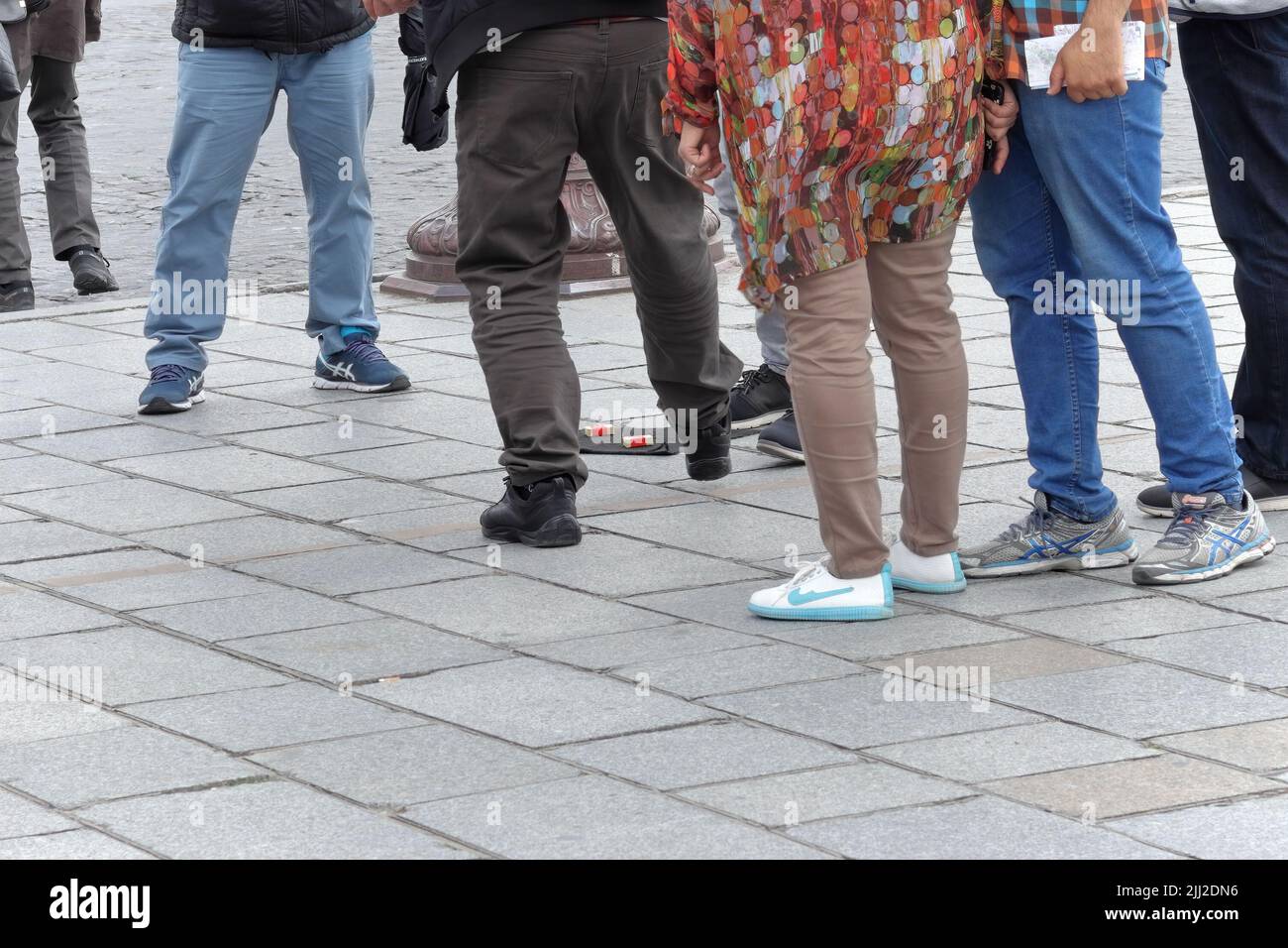 Paris / France - June 10, 2019: Con artists perform illegal shell game, confidence trick scam, performed with matchboxes Stock Photo