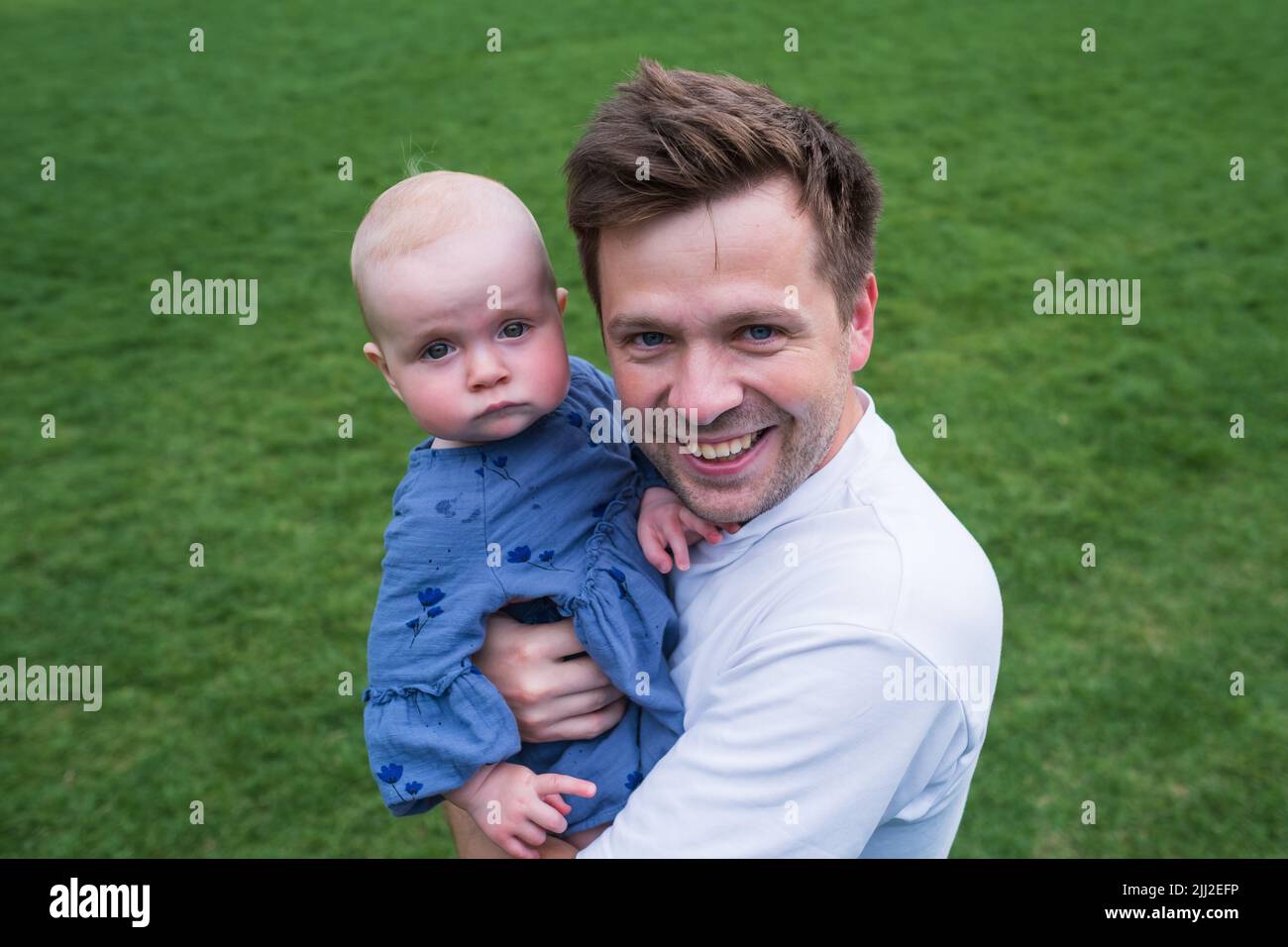 portrait of young father hugging his little daughter Stock Photo