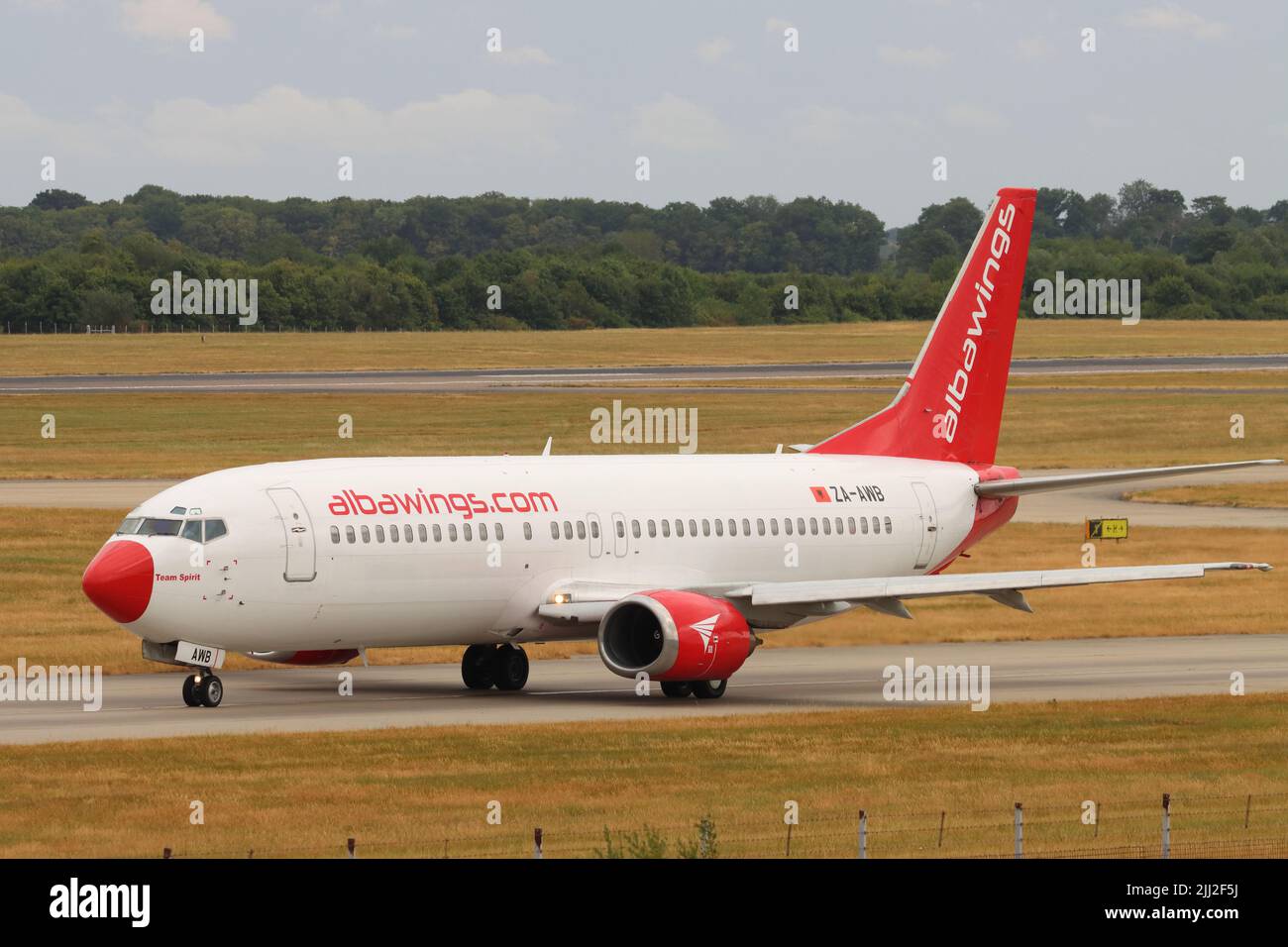 Albawings, Boeing 737 ZA-AWB, departing Stansted Airport, Essex, UK Stock Photo