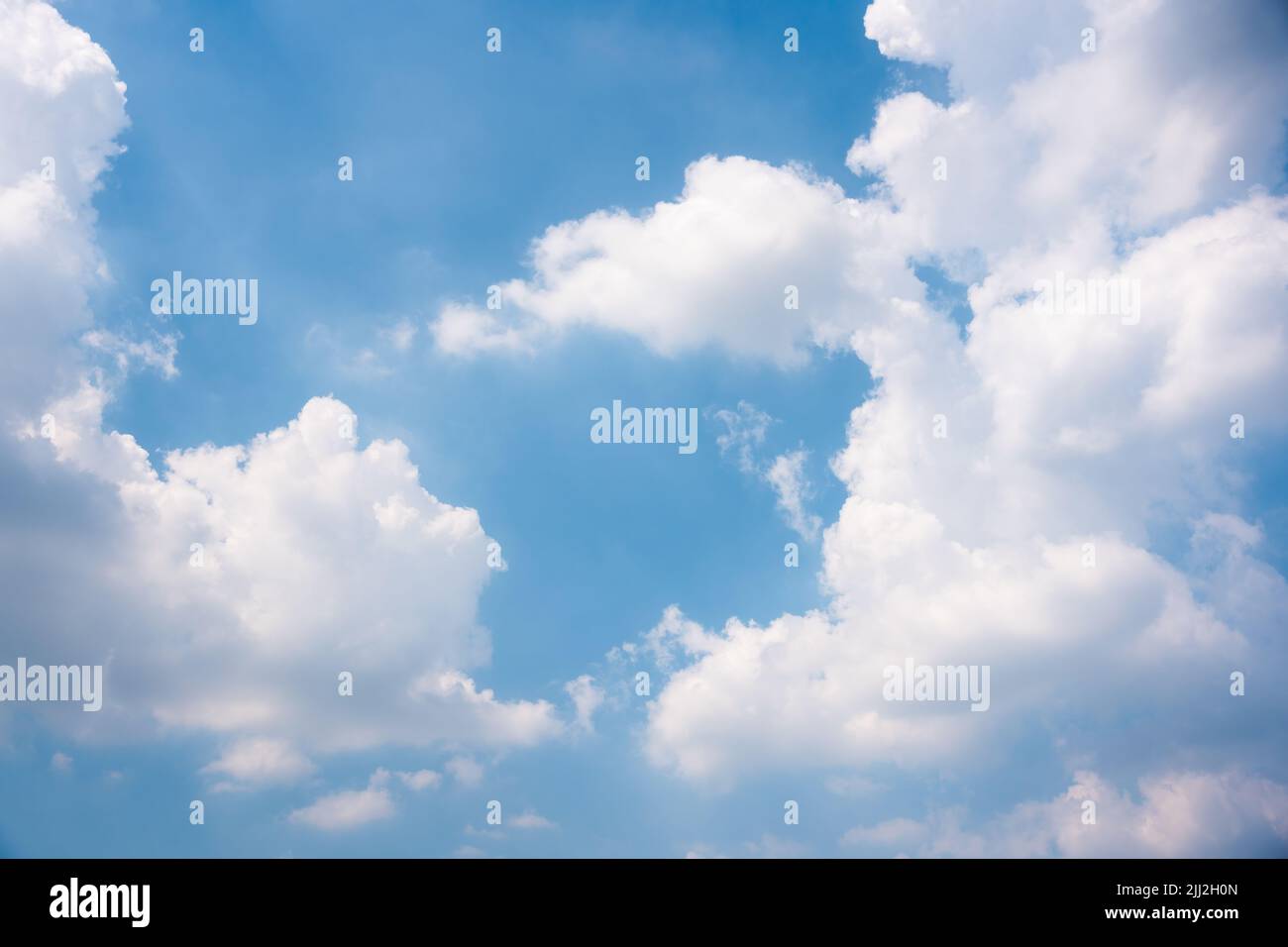White clouds on blue sky in bright day Stock Photo