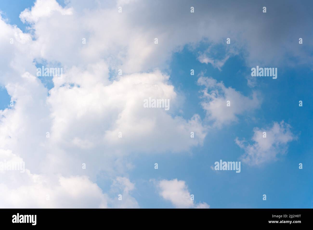 White clouds on blue sky in bright day Stock Photo