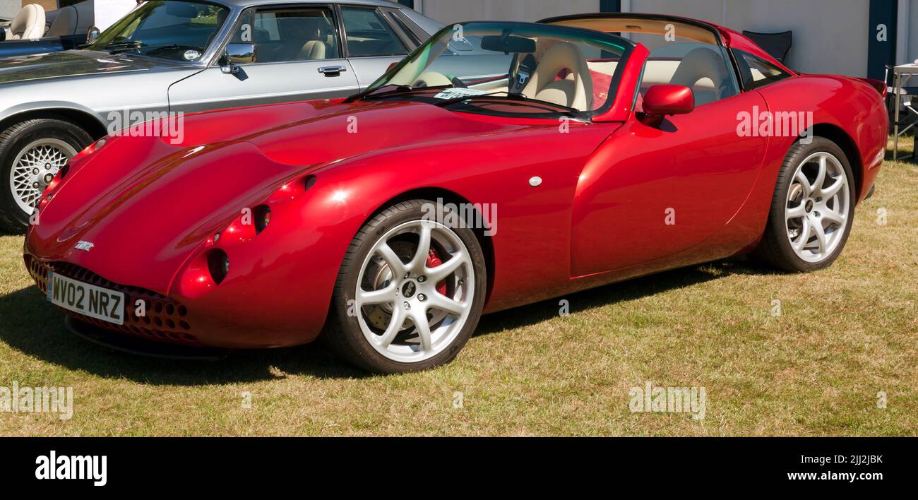 Three-quarters front view of a Red,  2002, TVR Tuscan S on display at the Sandwich Classic Car Show Stock Photo