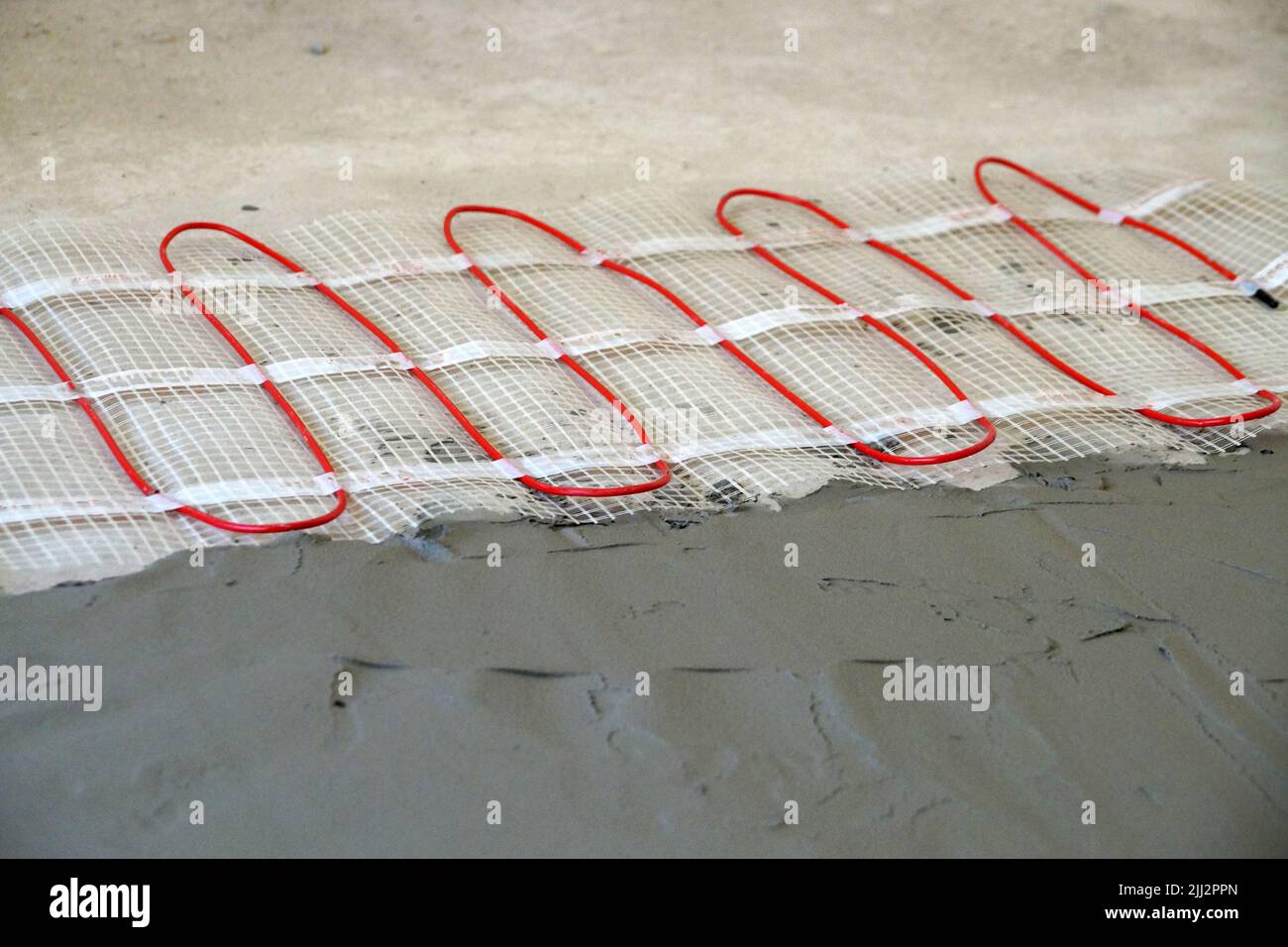 cable electric underfloor heating partially under cement screed close
