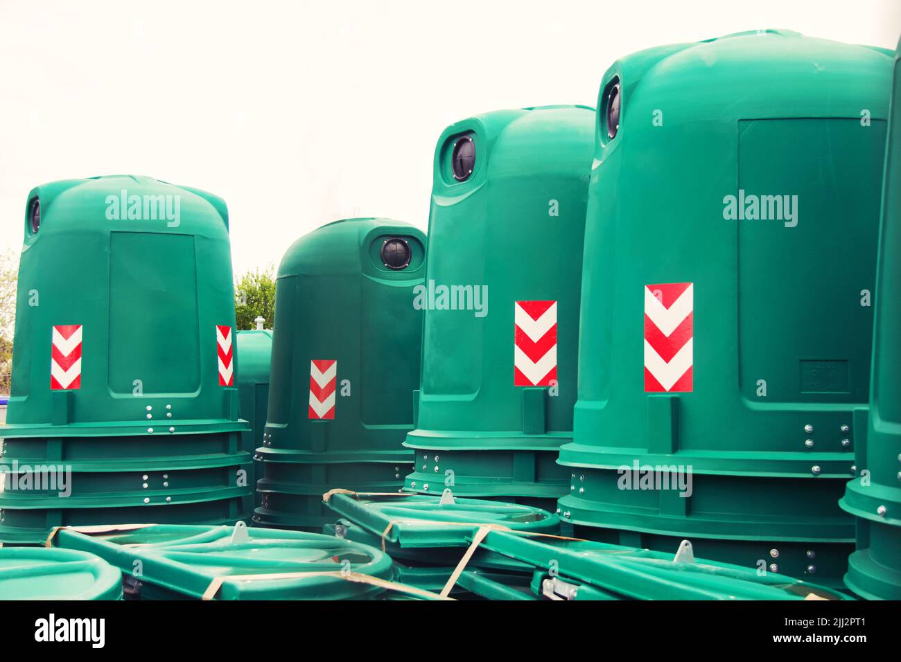 Pile of green containers for waste management of glass Stock Photo Alamy