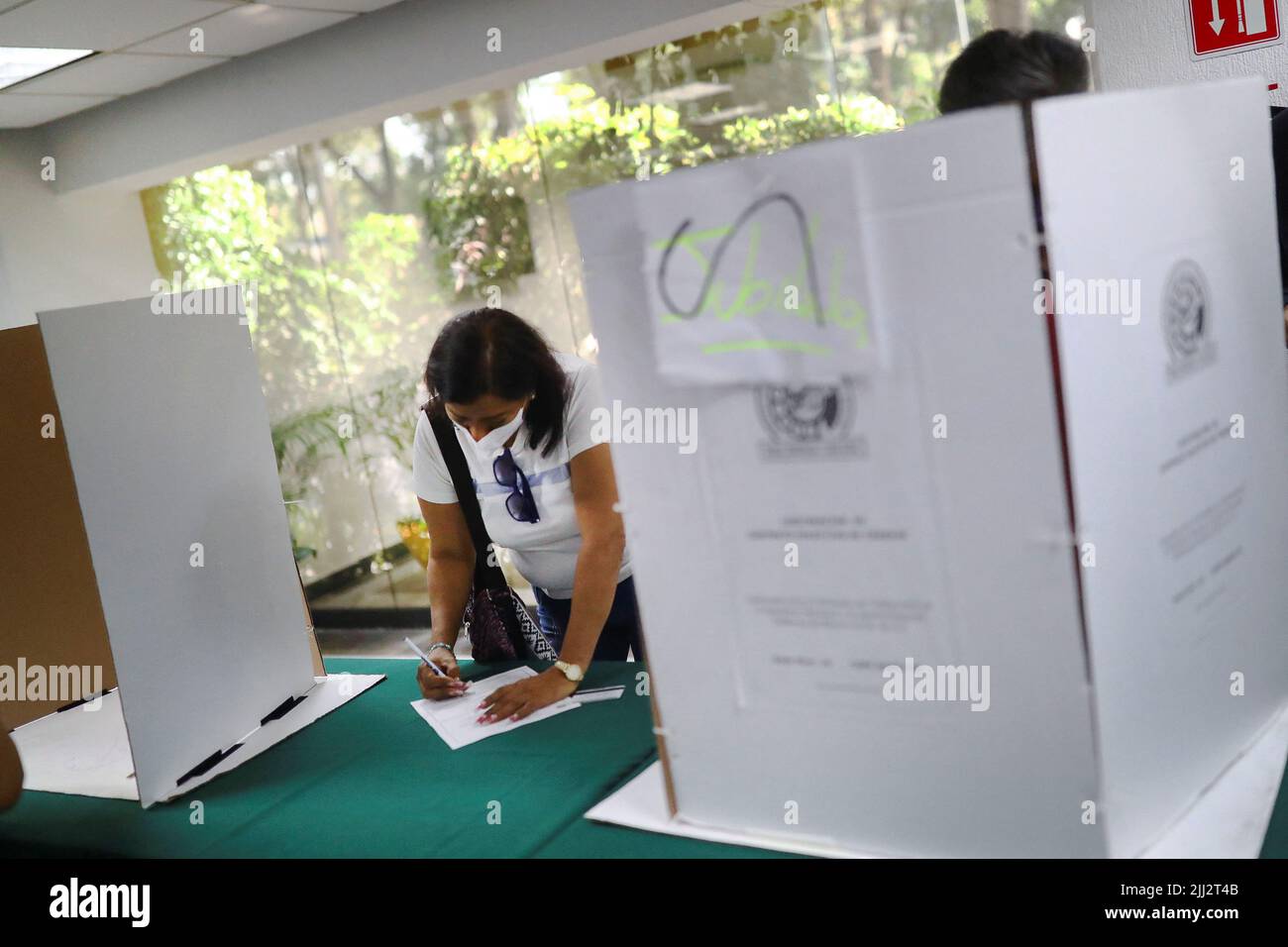 A worker of Telmex votes inside the headquarters of the Telmex Workers Union after the company's union went on strike after failing to come to an agreement with the company over a new collective labour agreement, in Mexico City, Mexico, July 22, 2022. REUTERS/Edgard Garrido Stock Photo