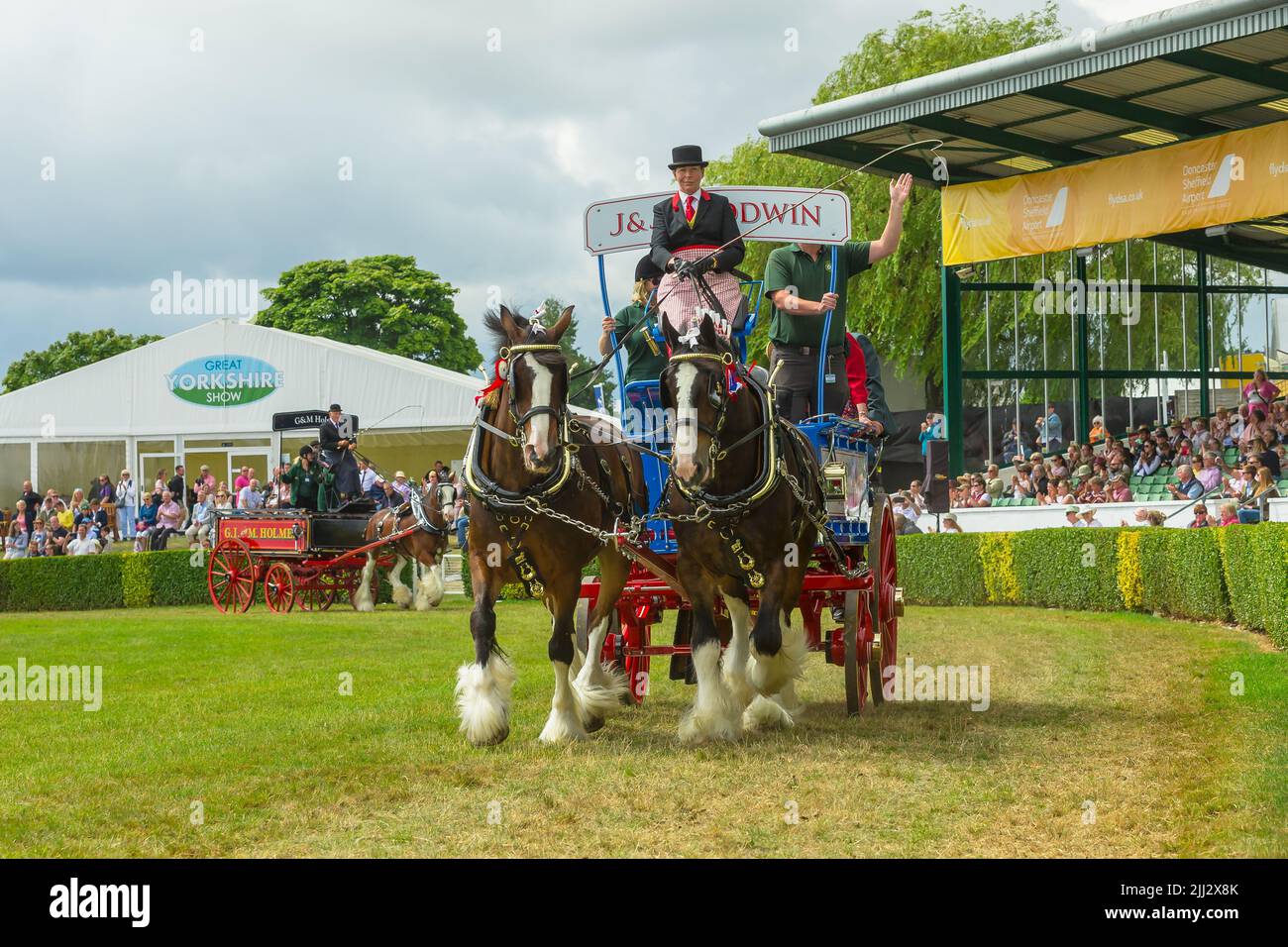 Great Yorkshire Show, Harrogate, UK. July 15, 2022. The Heavy Horse parade with winning Trade Turnout.  Four Wheeled.  J and J Goodwin.  Shire Horse t Stock Photo