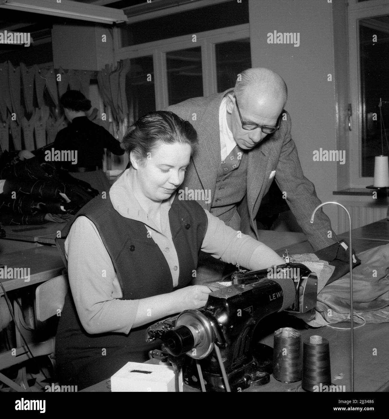 Custom tailoring Black and White Stock Photos & Images - Alamy