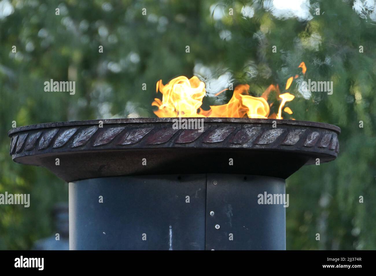 Eternal flame, constantly burning fire, a symbol of memory Stock Photo