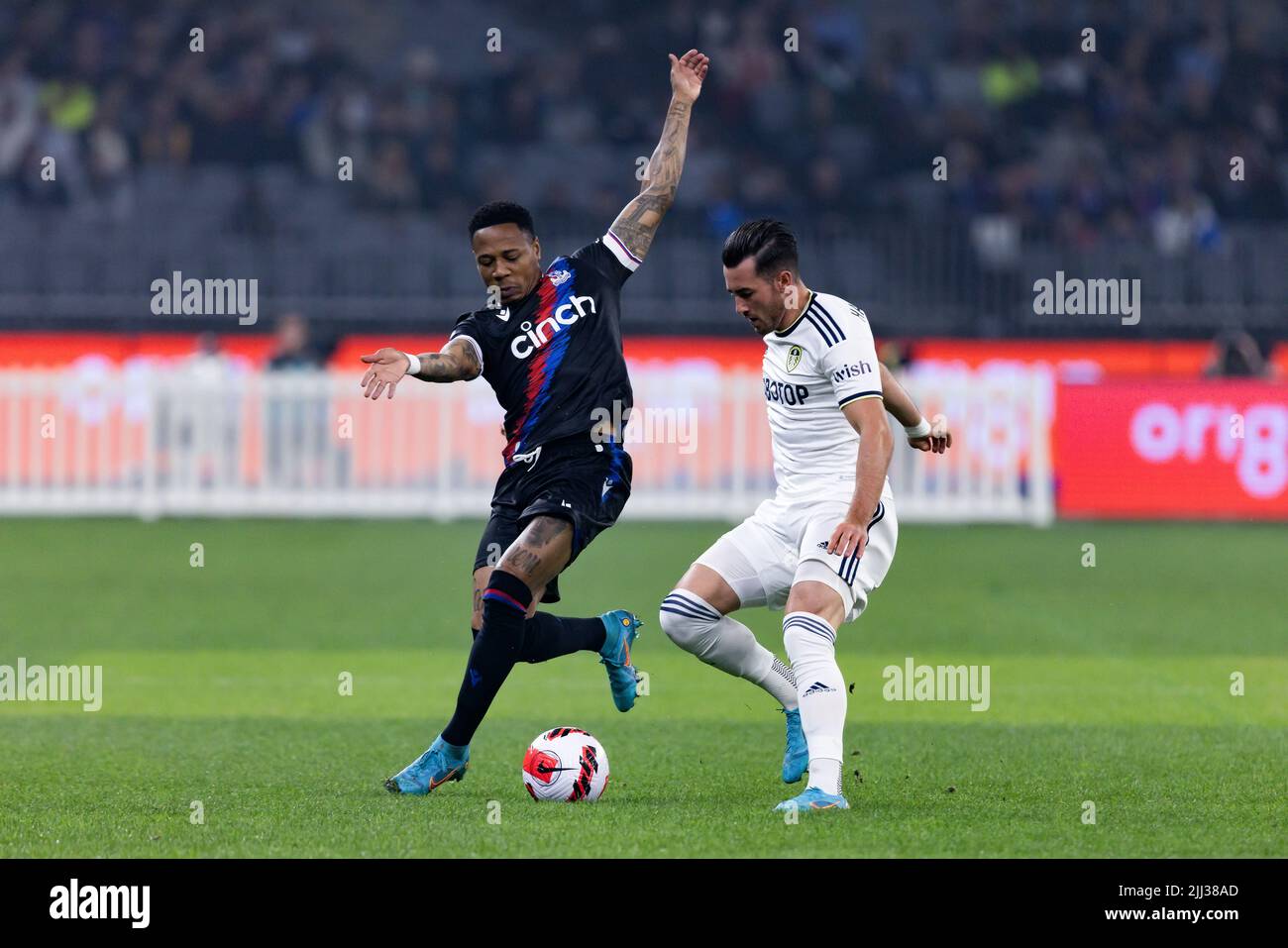 Perth, Australia, 22 July, 2022. Nathaniel Clyne of Crystal Palace is tackled by Jack Harrison of Leeds United during the ICON Festival of International Football match between Crystal Palace and Leeds United at Optus Stadium on July 22, 2022 in Perth, Australia. Credit: Graham Conaty/Speed Media/Alamy Live News Stock Photo