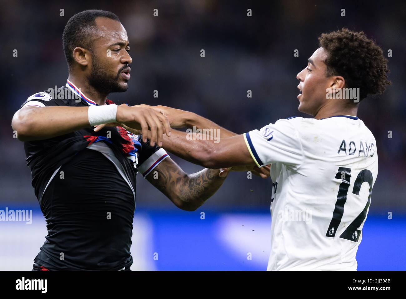 Perth, Australia, 22 July, 2022. Jordan Ayew of Crystal Palace and Tyler Adams of Leeds United scuffle during the ICON Festival of International Football match between Crystal Palace and Leeds United at Optus Stadium on July 22, 2022 in Perth, Australia. Credit: Graham Conaty/Speed Media/Alamy Live News Stock Photo
