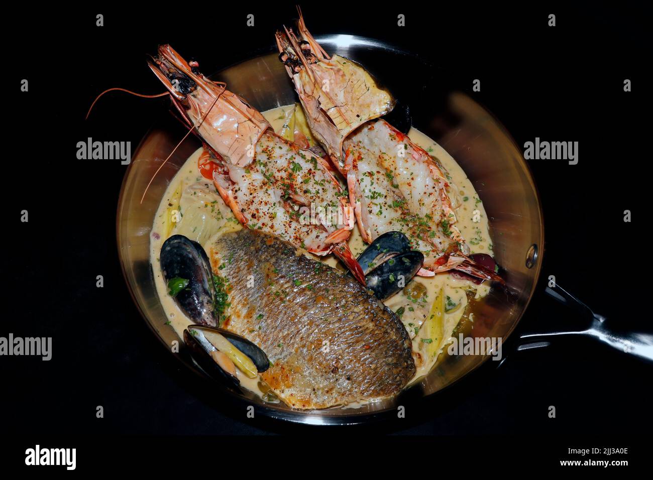 assorted seafood recipe, pan seared sea bass, grilled tiger prawns