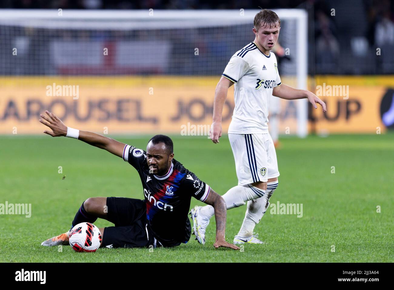 Perth, Australia, 22 July, 2022. Jordan Ayew of Crystal Palace goes to ground during the ICON Festival of International Football match between Crystal Palace and Leeds United at Optus Stadium on July 22, 2022 in Perth, Australia. Credit: Graham Conaty/Speed Media/Alamy Live News Stock Photo