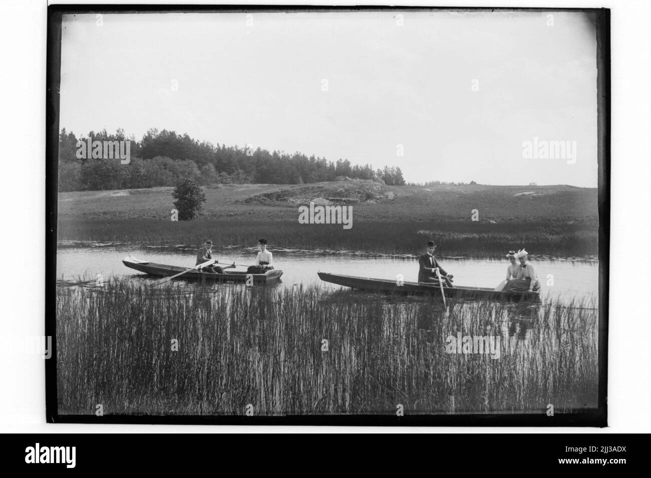 Water two rowing boats Black and White Stock Photos & Images - Alamy
