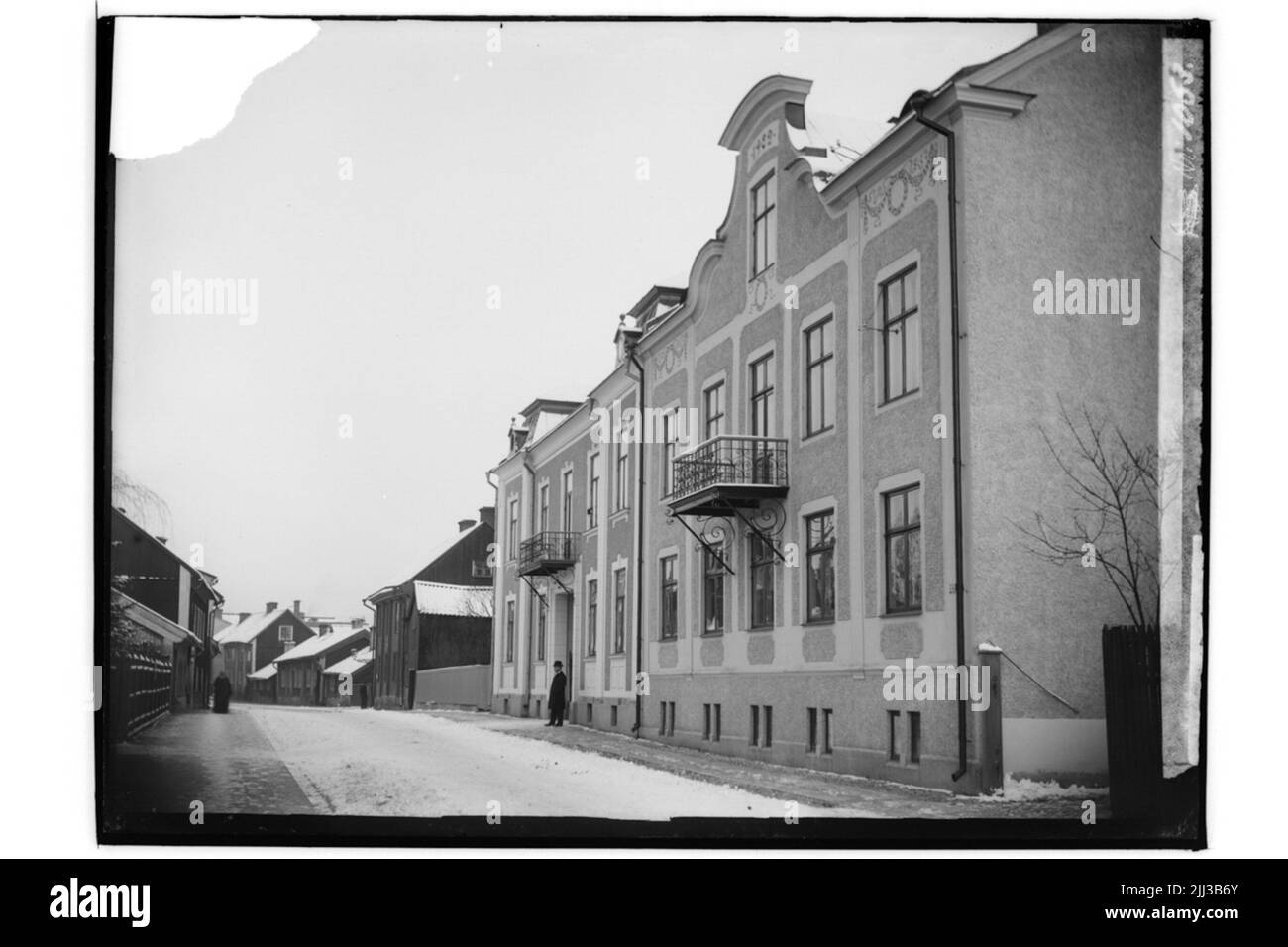 Two -storey apartment building and 7 other apartment buildings. The house facing the street. The property was built in 1922. Horse dealer N. Nilsson Stock Photo