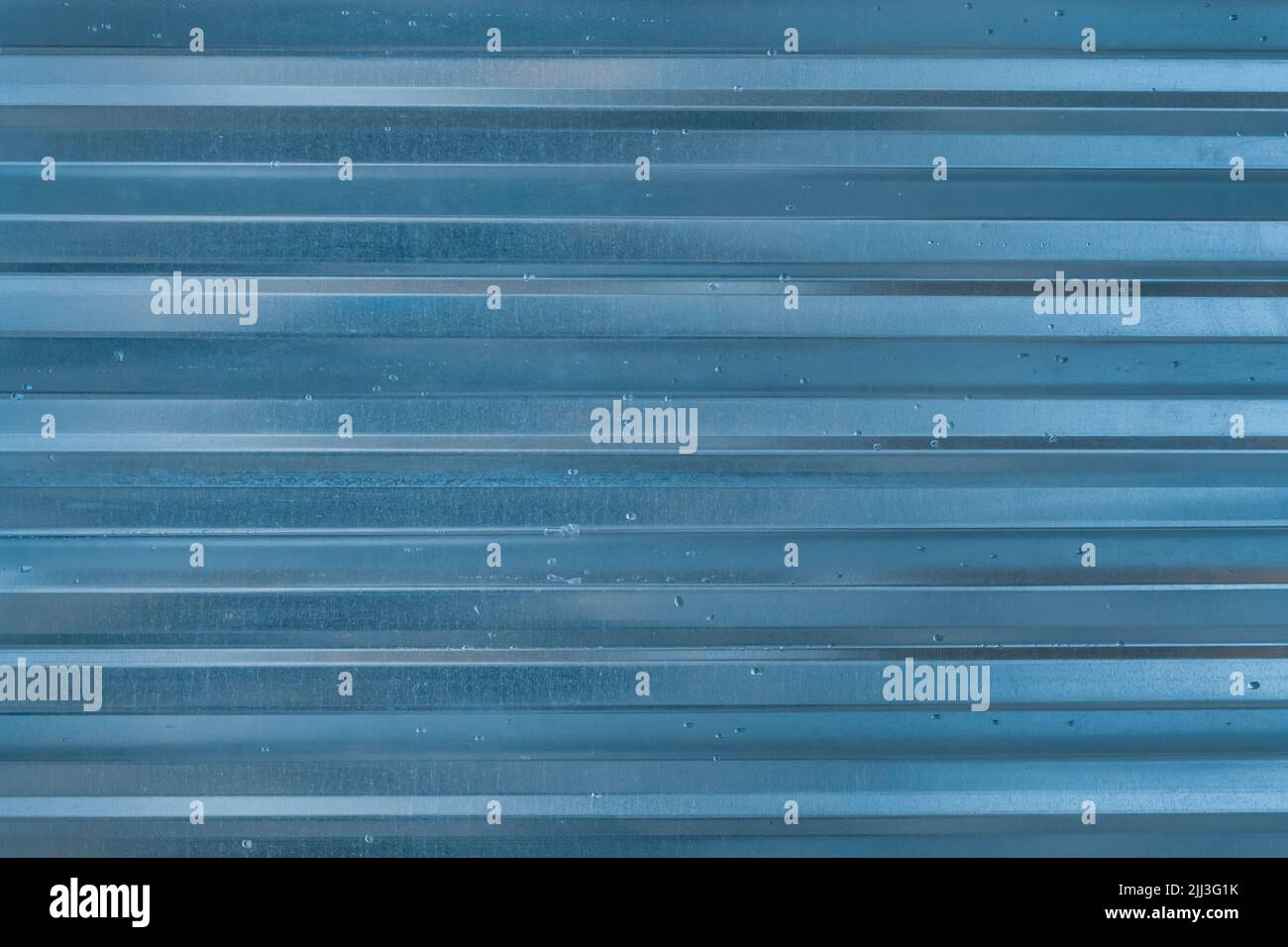 Corrugated Metal Blue Fence Steel Abstract Pattern Texture Background. Stock Photo