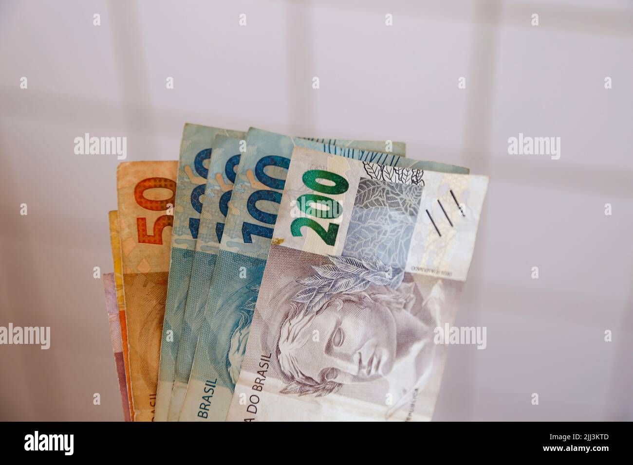 various banknotes from brazil - brazilian real banknotes Stock Photo