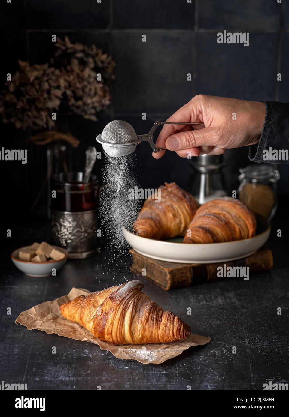 Food photography of croissant, breakfast, tea, milk, sugar Stock Photo