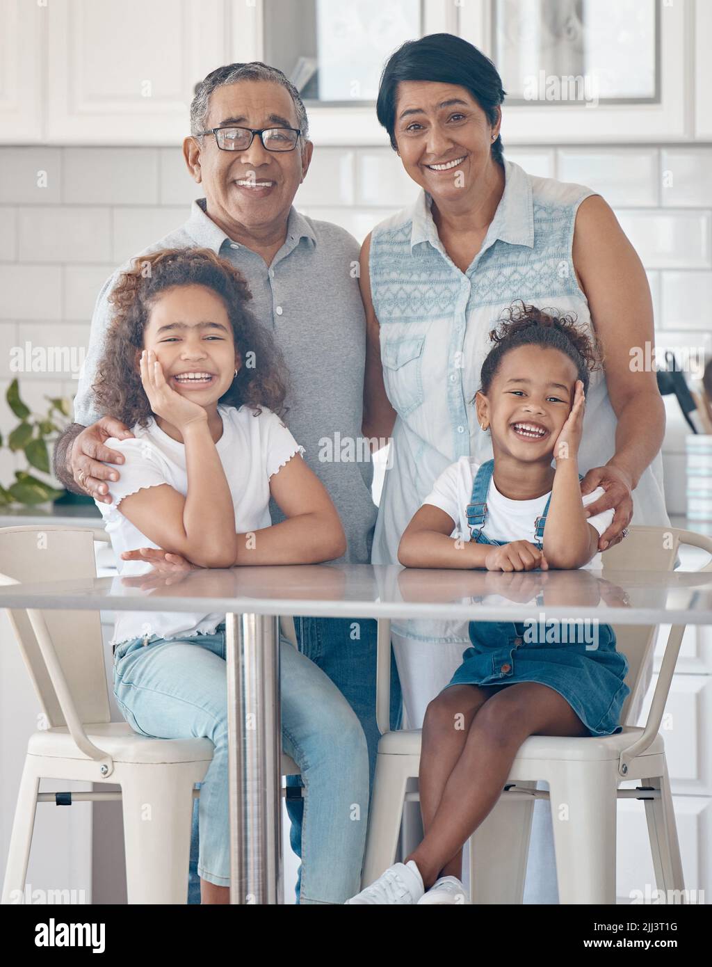 Seeing the little ones grow. grandparents spending time with their grandchildren. Stock Photo