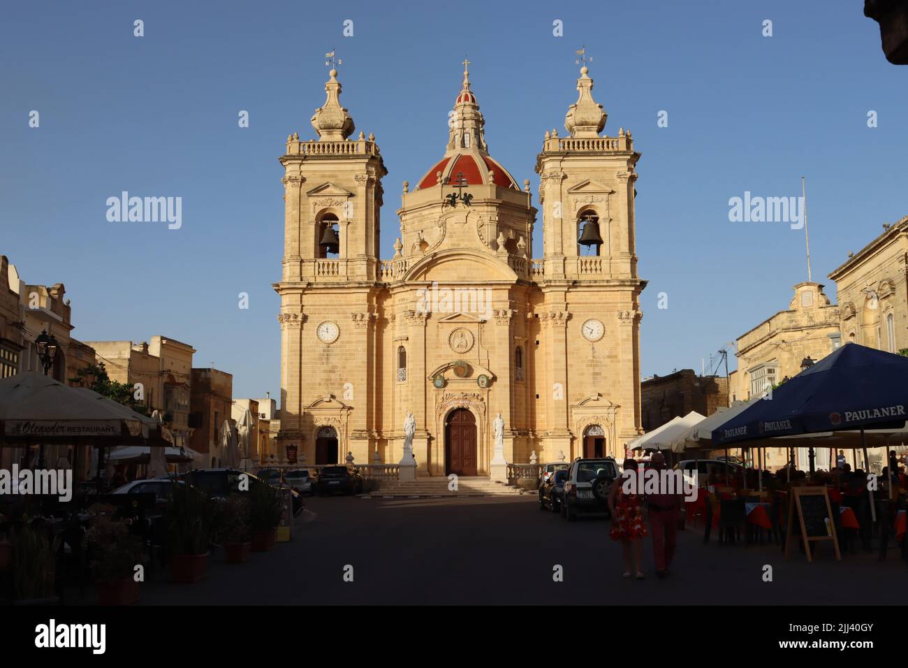 Evening sunlight illuminates the Basilica of the Nativity of Our Lady, Xaghra, Gozo, Malta. Stock Photo