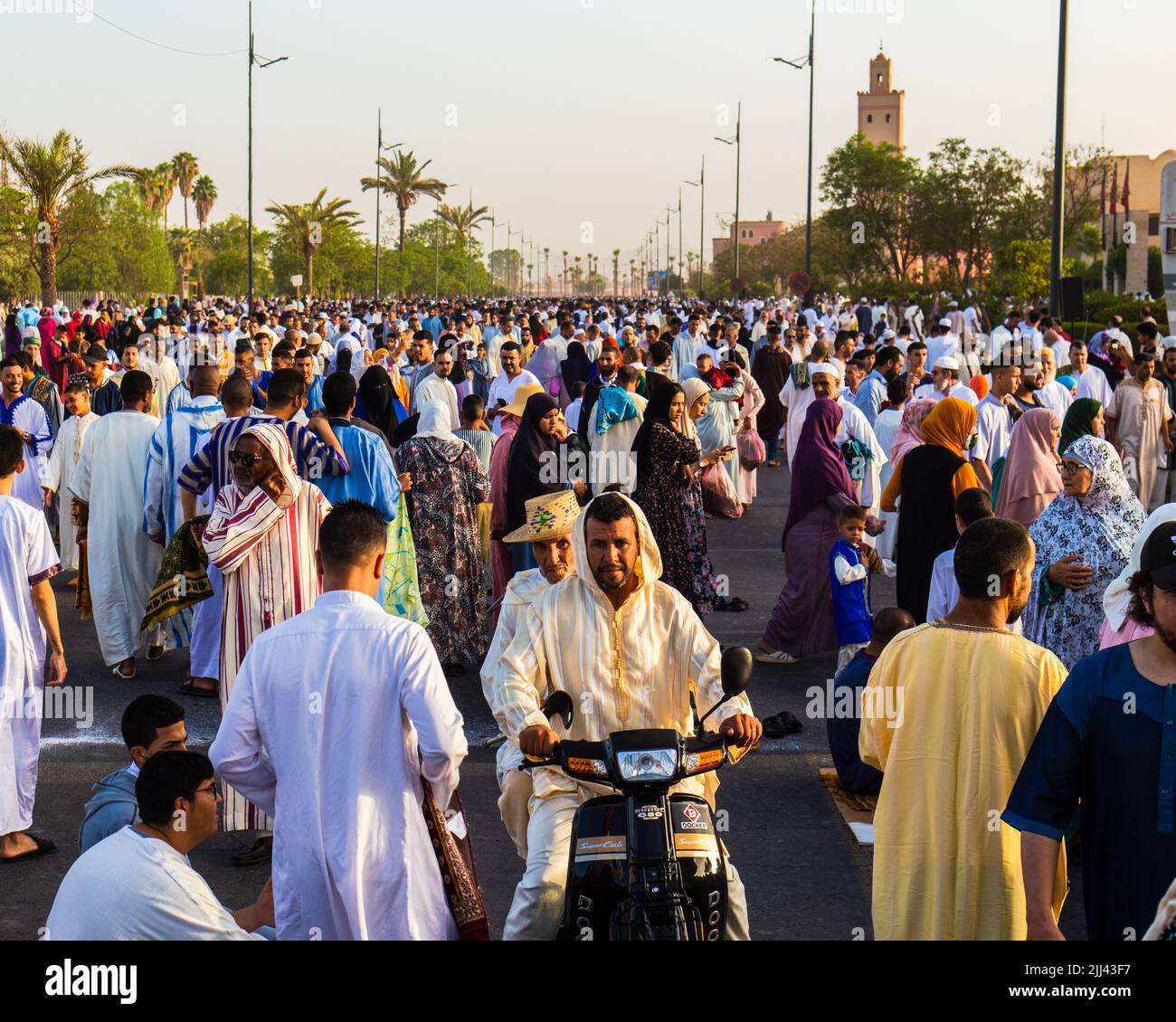 Marrakech, Morocco - 10 July 2022 : People hanging around after the prayer of Aid Al Adha 2022 in Marrakech, Morocco Stock Photo