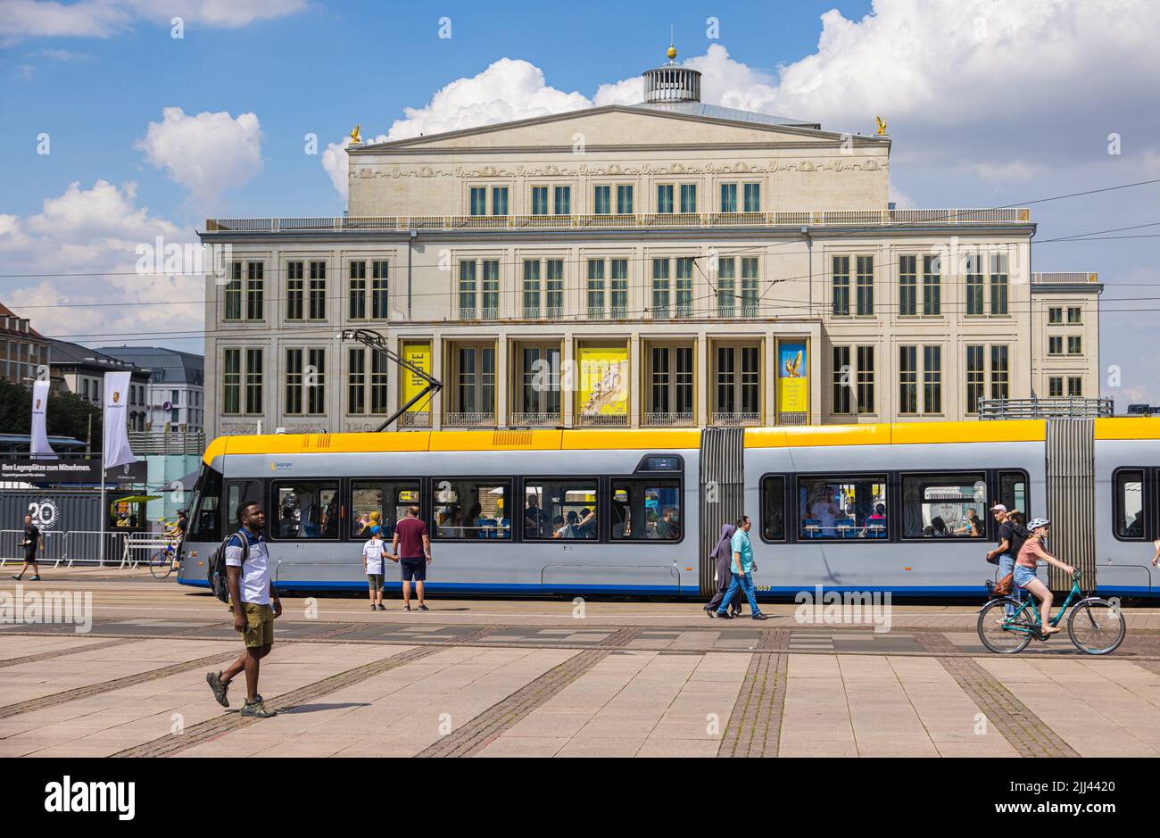 Leipzig, Germany - June 25, 2022: The opera house on the augustusplatz (Augustus Square). A modern Leipziger Tram on the Tram Stop in front of the ope Stock Photo