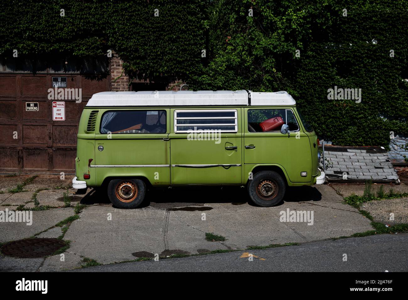 A Volkswagen Bus, one the German motor vehicle manufacturer's original models brought to the market in the 1950s, sits on a sidewalk in Troy, New York, U.S., July 22, 2022. REUTERS/Shannon Stapleton Stock Photo