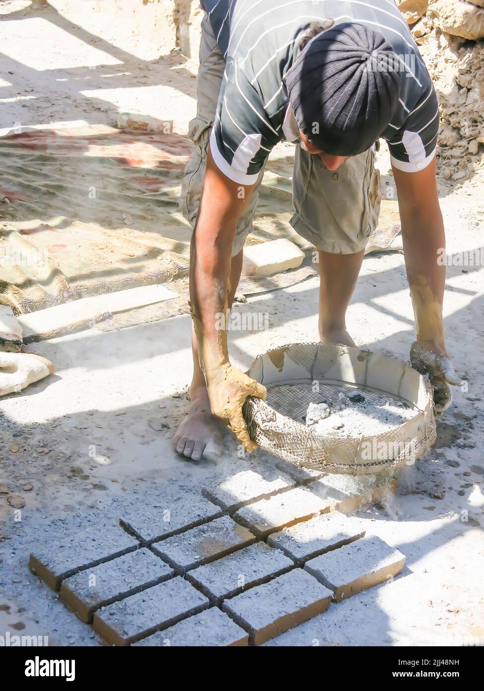 Brickmaking in Tunisian Town of Tozeur Stock Photo