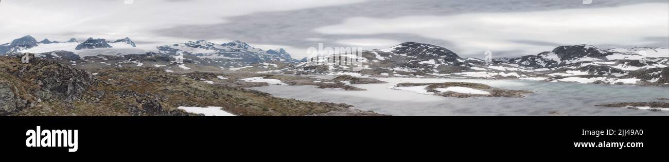 Panoramic View of Hardangervidda Norway, the roof of Norway, glaciers, and snow-covered.  Edited to create an illustration from a photo. Stock Photo