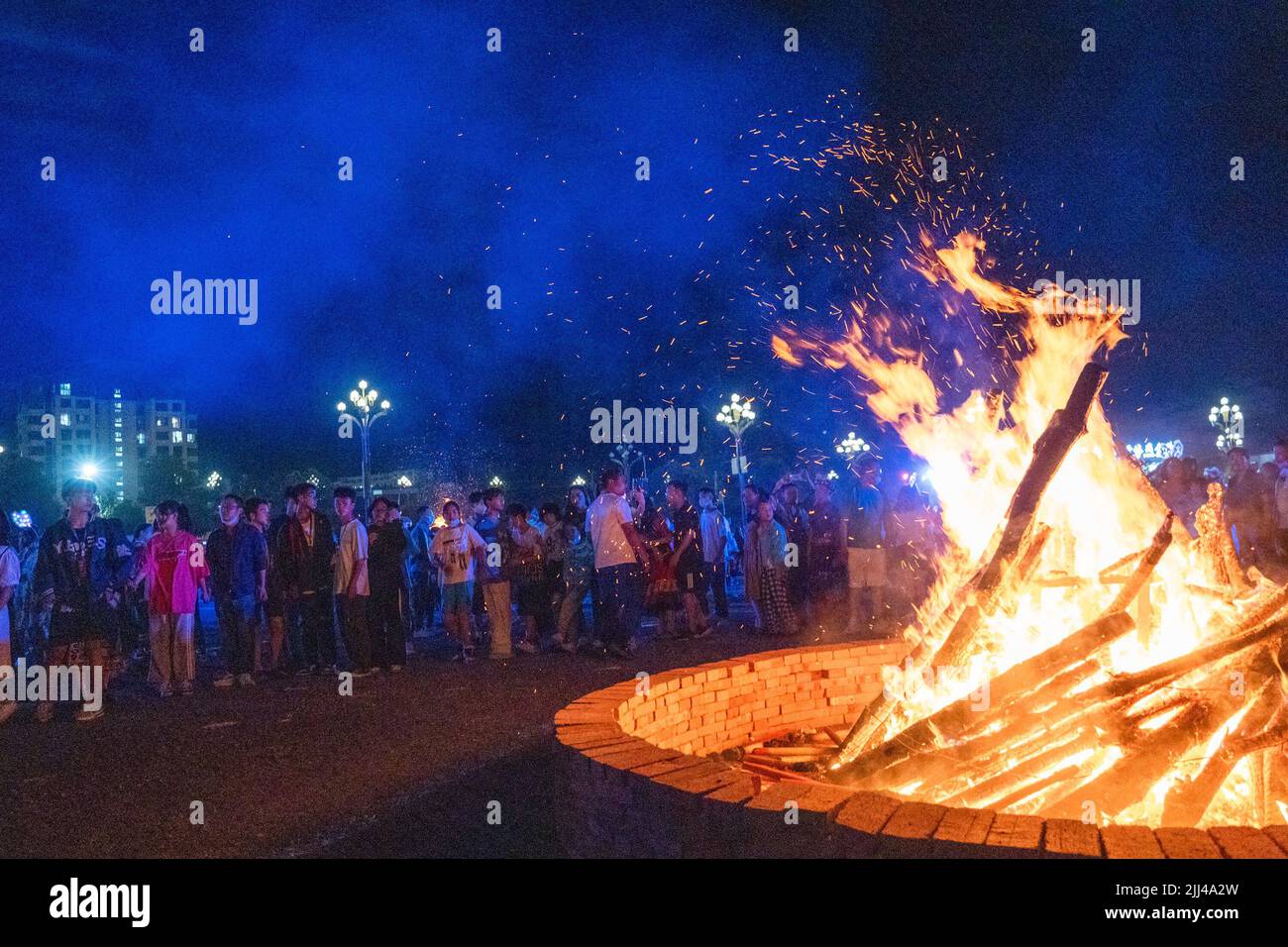 BIJIE, CHINA - JULY 22, 2022 - People of yi ethnic group celebrate the Torch Festival with tourists at baili Azalea Management Area in Bijie city, Sou Stock Photo