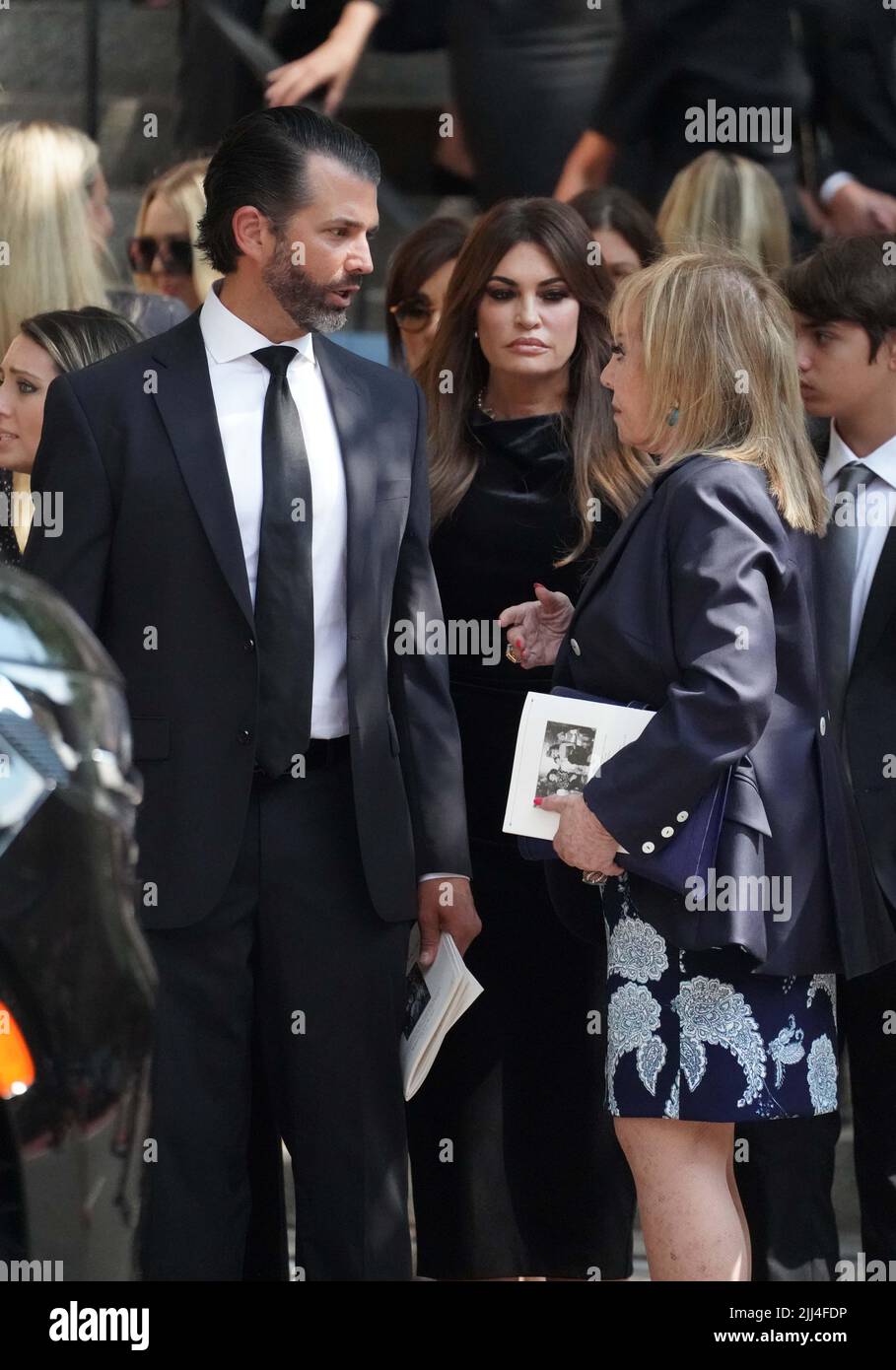 New York, United States. 19th July, 2022. Donald Trump Jr. and Kimberly Guilfoyle greet guests as they exit Ivana Trump's funeral services at St Vincent Ferrer Catholic Church in New York City. (Photo by Catherine Nance/SOPA Images/Sipa USA) Credit: Sipa USA/Alamy Live News Stock Photo