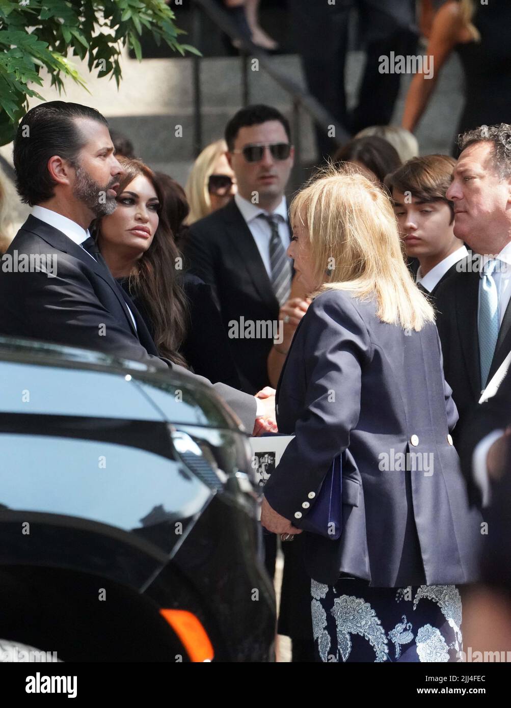 New York, United States. 19th July, 2022. Donald Trump Jr. and Kimberly Guilfoyle greet guests as they exit Ivana Trump's funeral services at St Vincent Ferrer Catholic Church in New York City. (Photo by Catherine Nance/SOPA Images/Sipa USA) Credit: Sipa USA/Alamy Live News Stock Photo