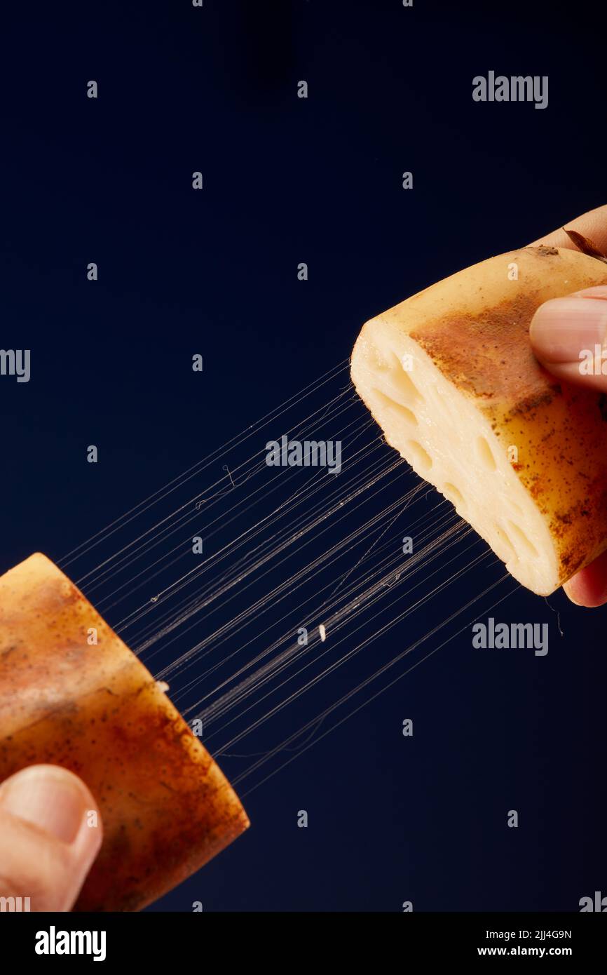 A closeup of the wire drawing effect of a lotus root after being cut