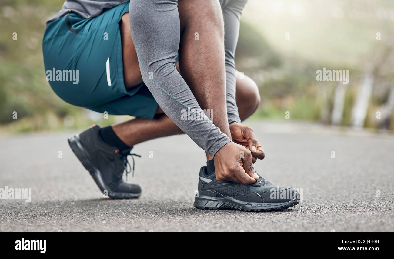 Picture of Woman runner happy tying running shoes 张照片 - Shutterstock