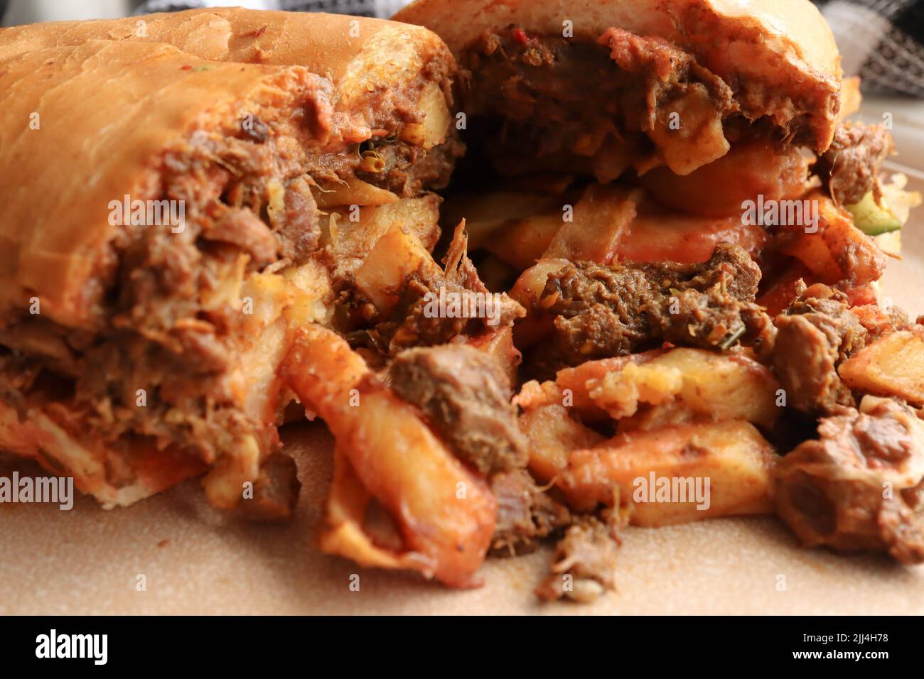 Masala steak gatsby. Traditional South African fast food. Roll with