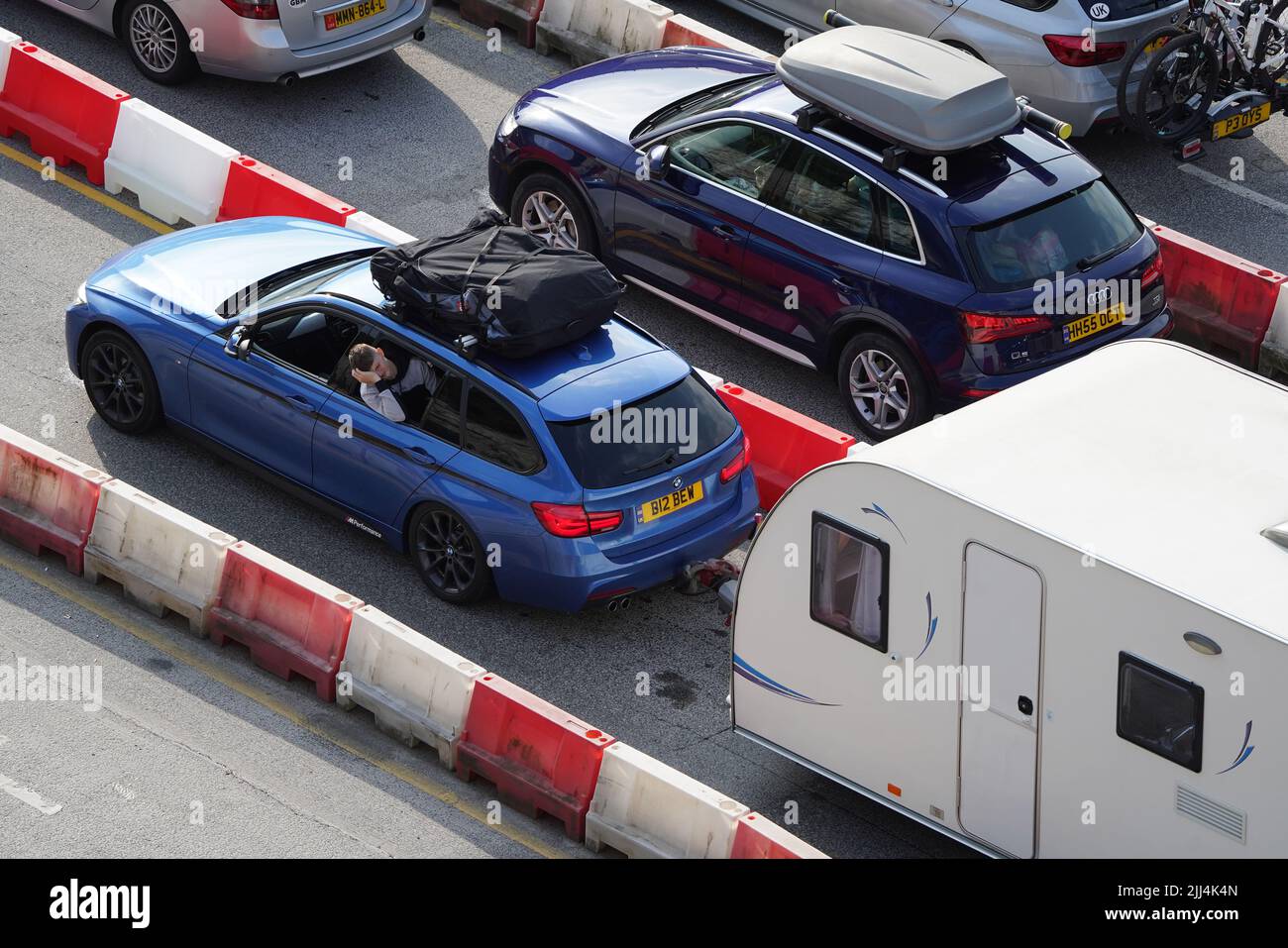 Cars queue at the check-in at the Port of Dover in Kent as many ...
