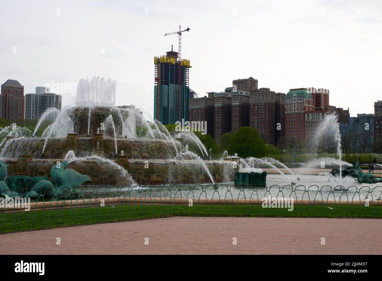 CHICAGO, ILLINOIS, UNITED STATES - May 12, 2018: Buckingham Fountain is a 3-tiered fountain with light and water shows in Grant Park, built in 1927 Stock Photo