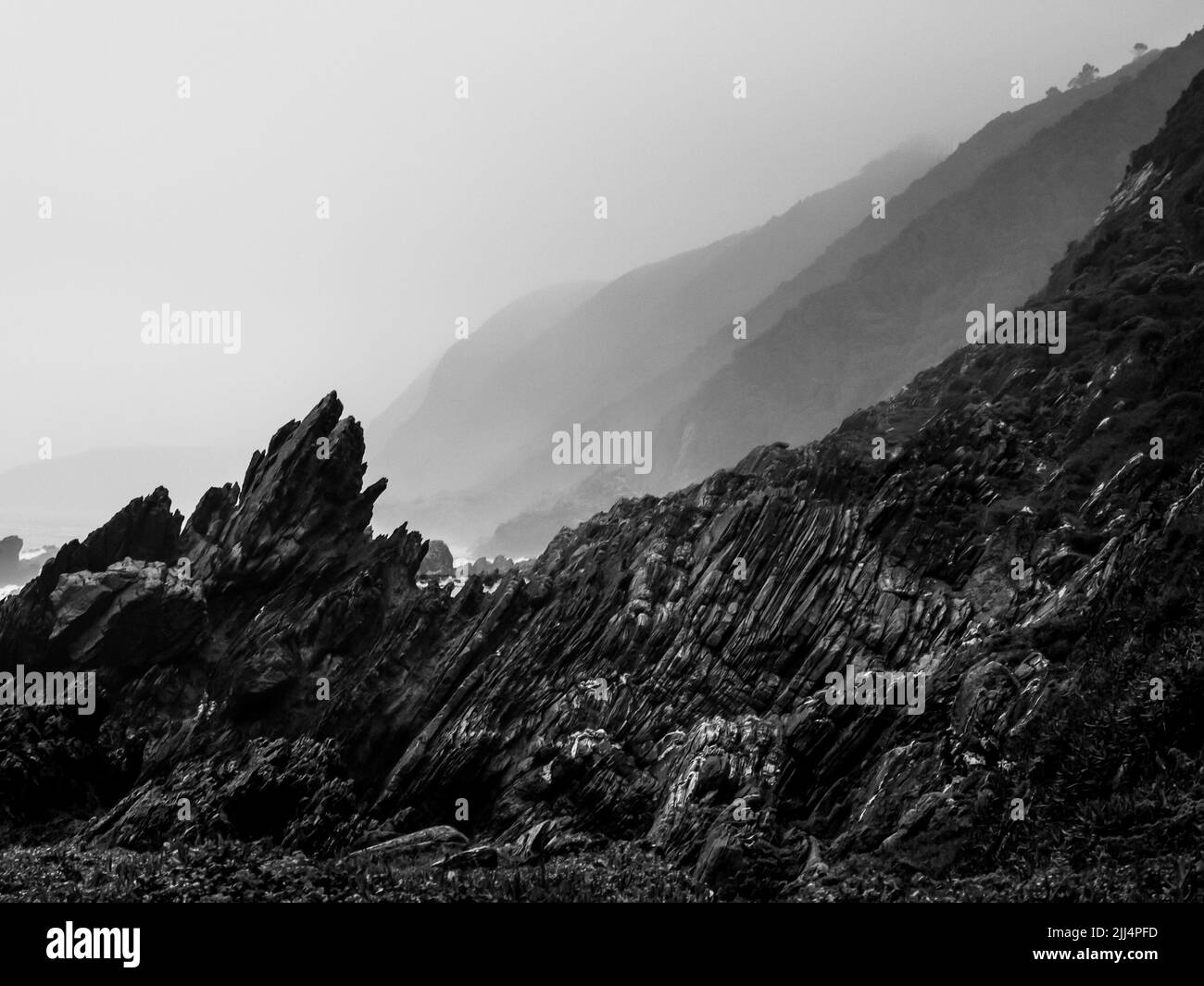 The jagged and serrated rocks of the Rocky Tsisikamma coastline Stock Photo