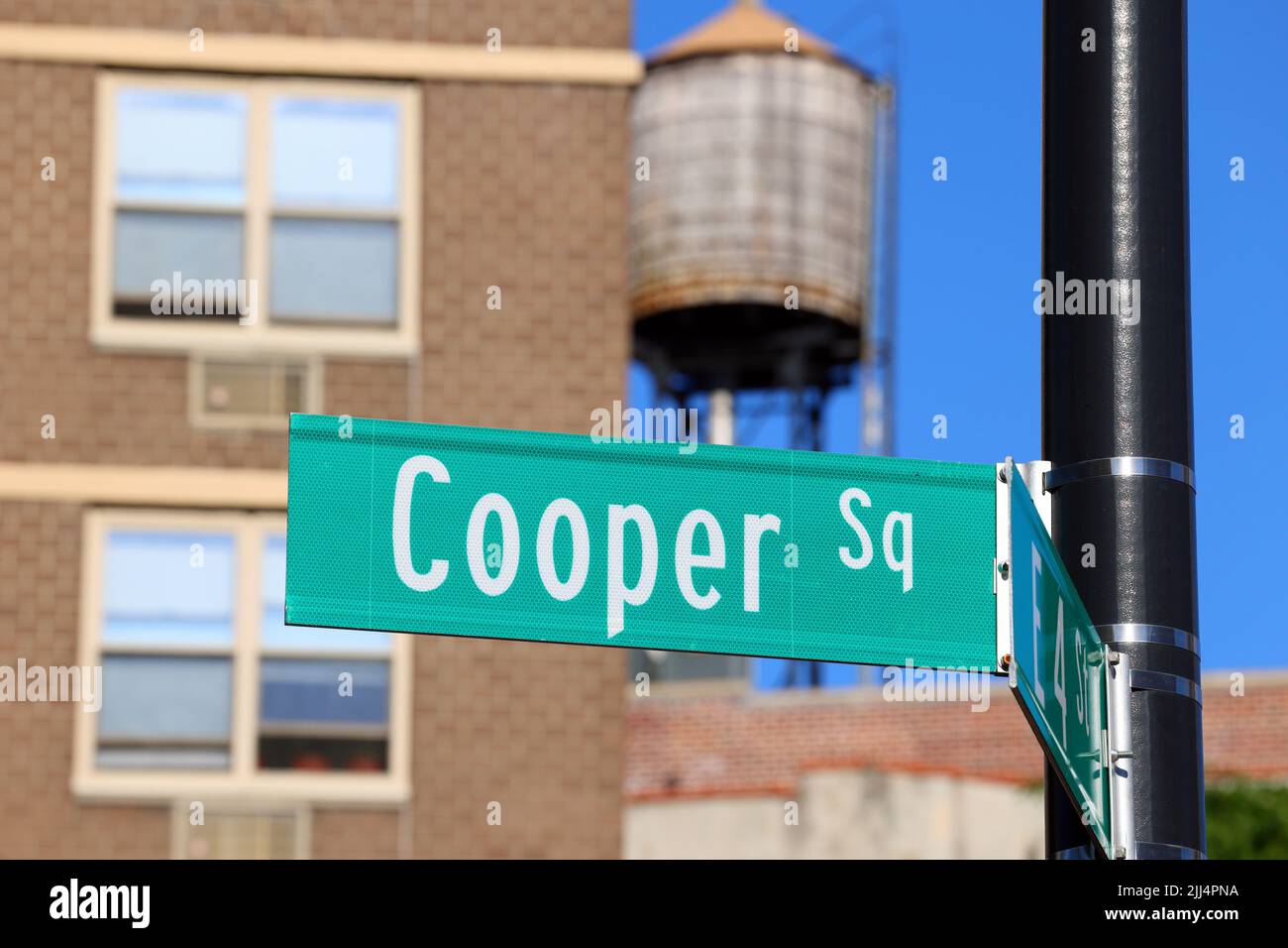 Cooper Sq street sign in Manhattan East Village, Lower East Side, New York. Cooper Square street sign near Fourth Arts Block. Stock Photo